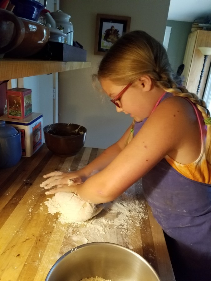 Kaileena kneading bread dough