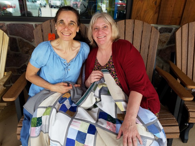 Kim and I with lapquilt.jpg