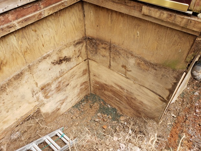 Oct7 wall under front door.jpg