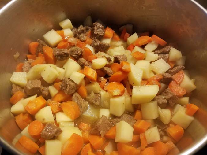 carrots and potatoes added and mixed.jpg